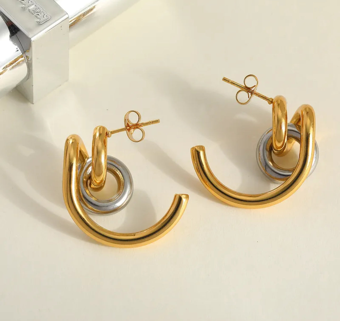 Artes círculo plateado