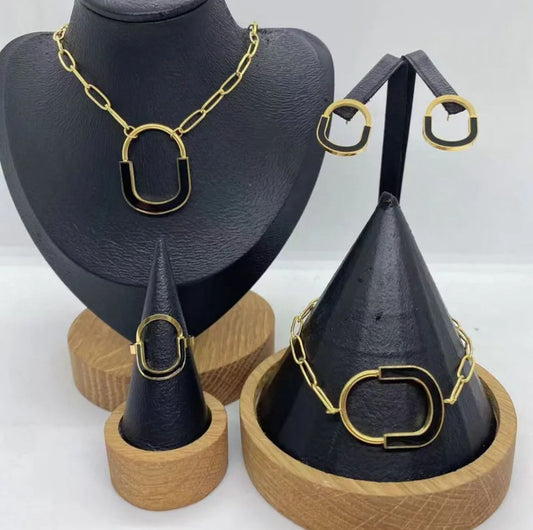 Set ovalado bicolor negro y dorado